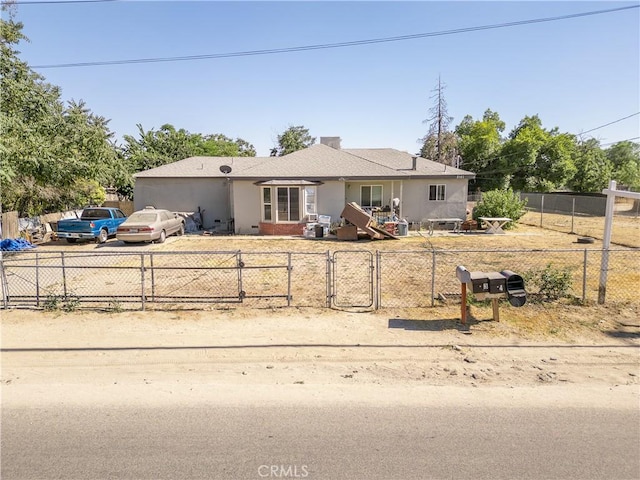 2161 Blake St, San Bernardino, CA 92407 - view of front facade featuring fence and a gate