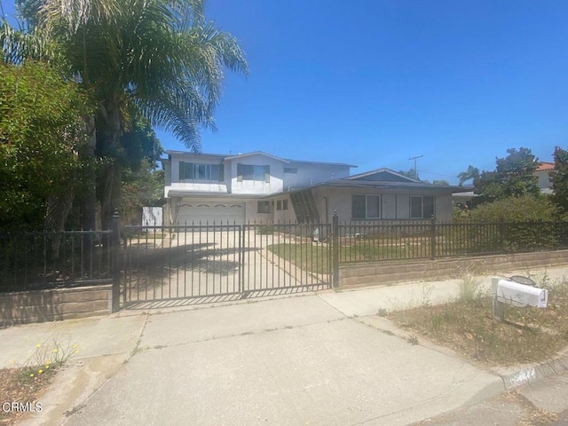 view of front of property with a garage