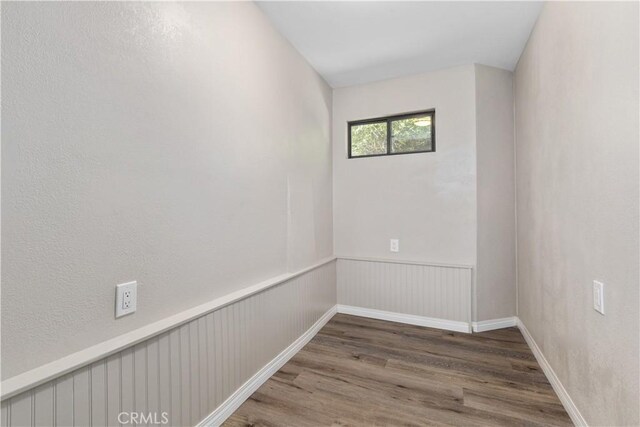 unfurnished room featuring hardwood / wood-style floors