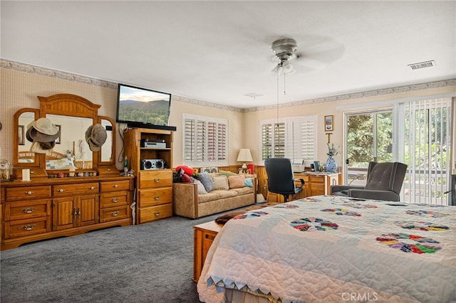 bedroom featuring ceiling fan, carpet flooring, and access to exterior