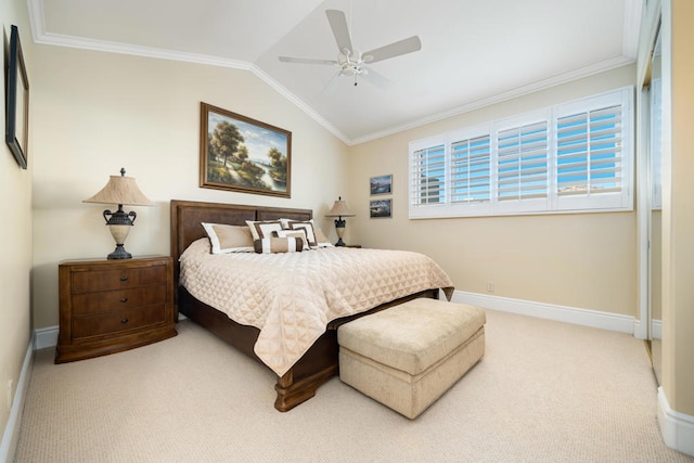 carpeted bedroom with ornamental molding, vaulted ceiling, and ceiling fan