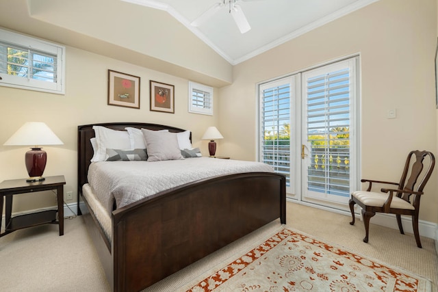 carpeted bedroom with ceiling fan, crown molding, vaulted ceiling, and multiple windows