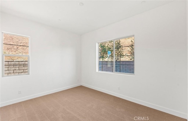 view of carpeted spare room