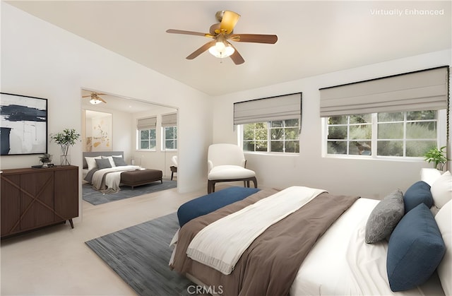 bedroom featuring lofted ceiling and ceiling fan