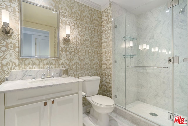 bathroom featuring vanity, toilet, and an enclosed shower