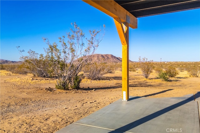 view of patio with a mountain view