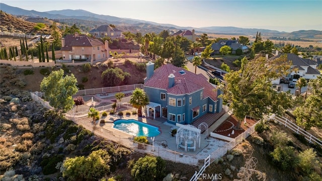 bird's eye view with a mountain view