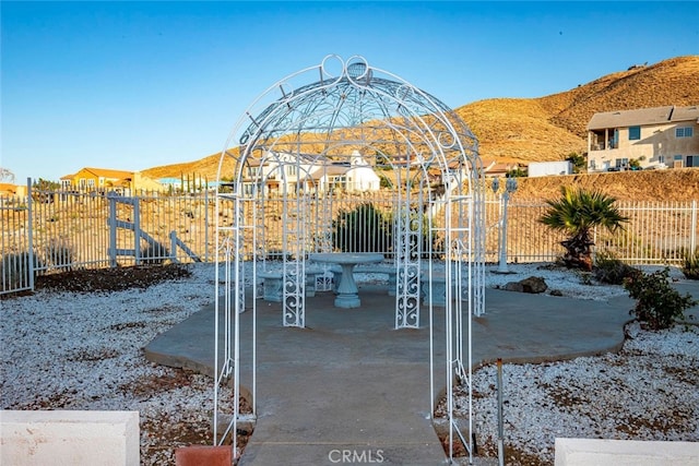 view of patio with a mountain view