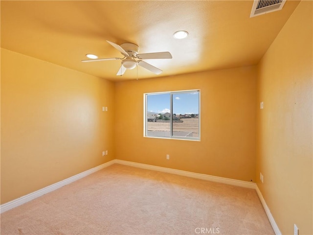 unfurnished room featuring carpet floors and ceiling fan