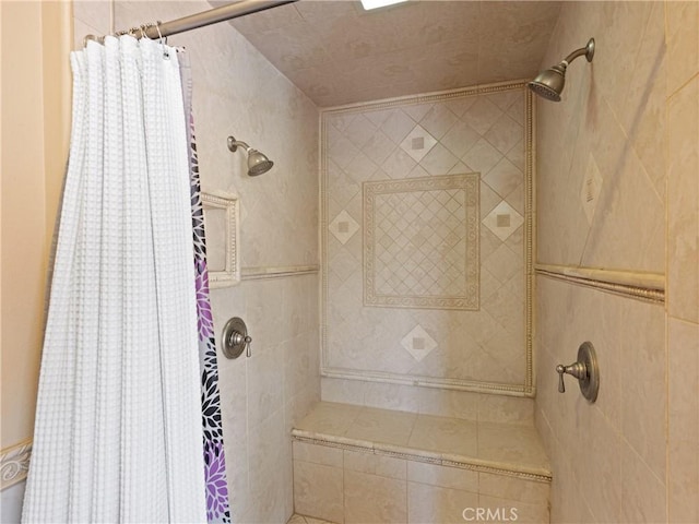 bathroom with a shower with curtain