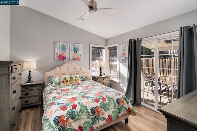 bedroom featuring vaulted ceiling, ceiling fan, access to outside, and light hardwood / wood-style flooring