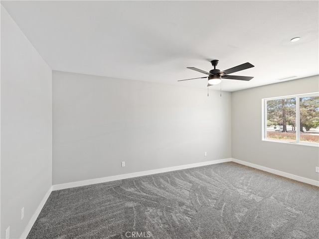 carpeted empty room with ceiling fan