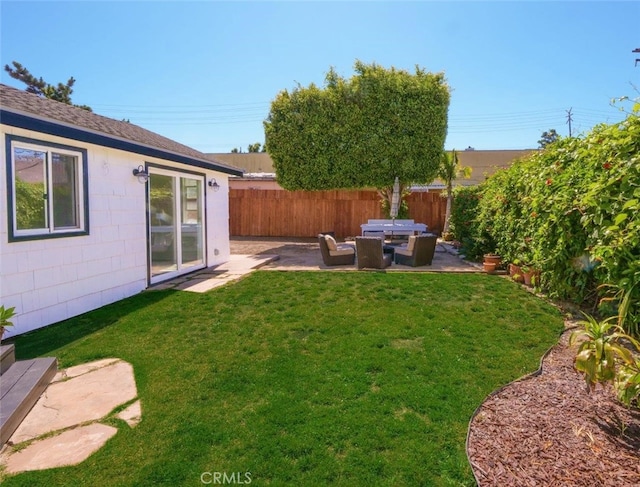 view of yard with a patio area and outdoor lounge area