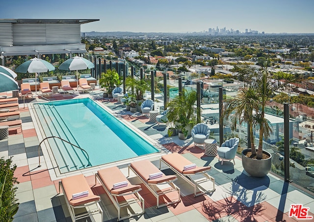 view of swimming pool featuring a patio