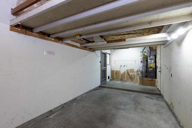 basement featuring gas water heater