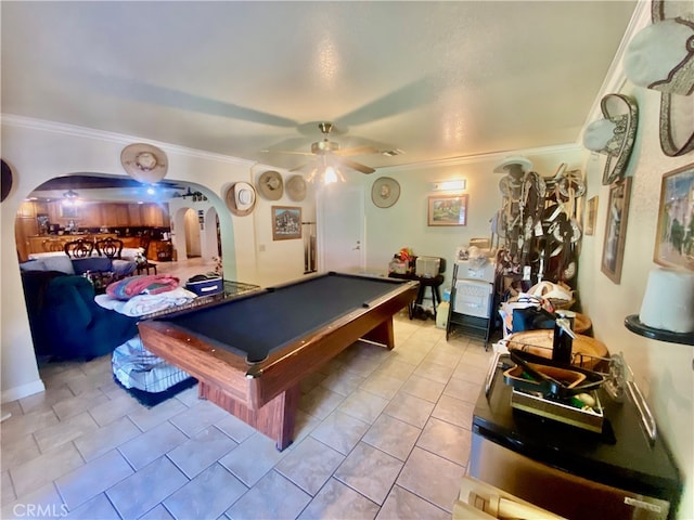 playroom with ceiling fan, light tile patterned floors, ornamental molding, and pool table