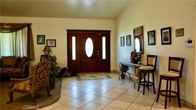 entryway featuring light tile patterned floors