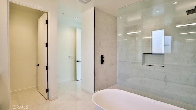 bathroom featuring separate shower and tub