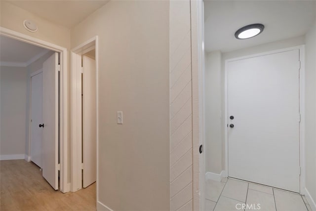 hallway featuring light hardwood / wood-style flooring