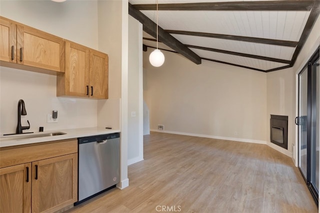 kitchen featuring vaulted ceiling with beams, light hardwood / wood-style flooring, hanging light fixtures, and stainless steel dishwasher