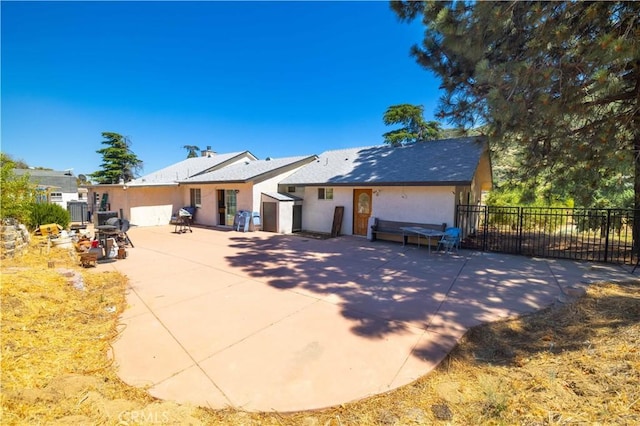 view of front of property with a patio