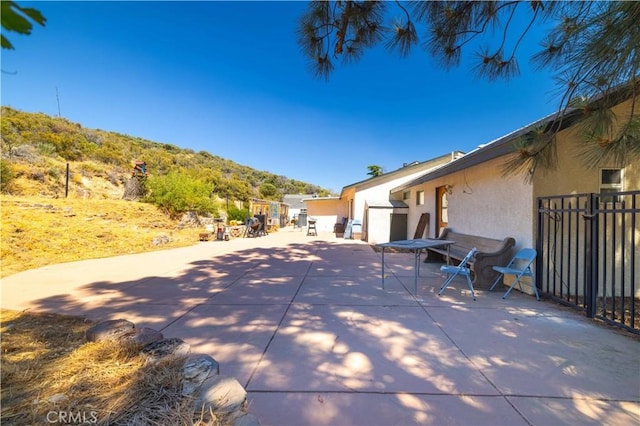 view of patio featuring a mountain view