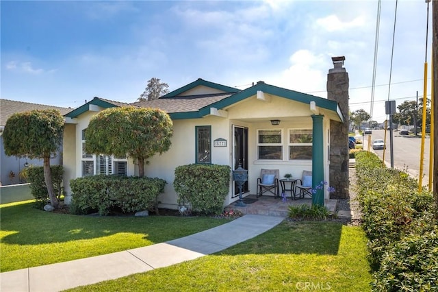 view of front of home with a front yard