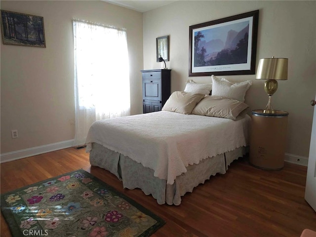 bedroom featuring hardwood / wood-style flooring