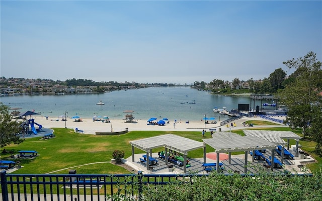 property view of water with a gazebo and a beach view