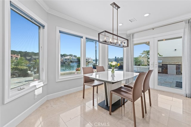 interior space featuring a water view and a wealth of natural light