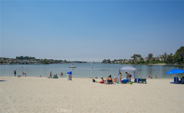 view of water feature with a beach view