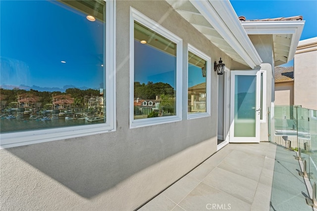 view of side of home featuring a patio