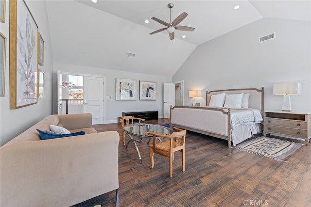 bedroom featuring ceiling fan, high vaulted ceiling, and dark hardwood / wood-style flooring