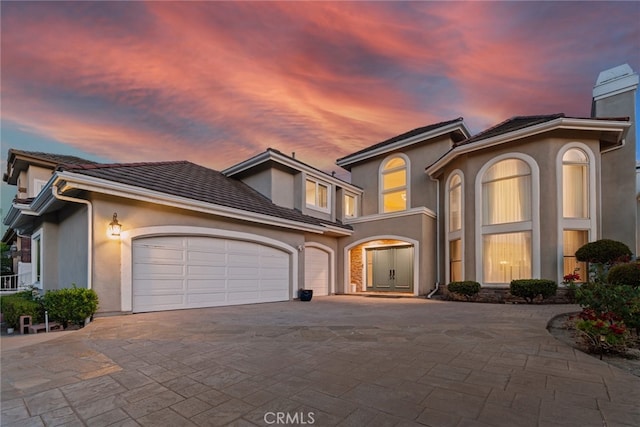 view of front of home featuring a garage