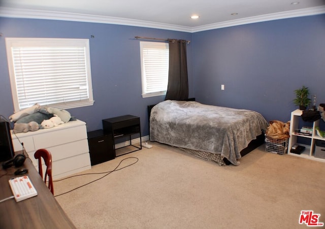 bedroom with light carpet and crown molding