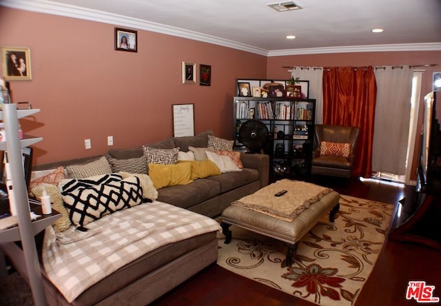 living room with hardwood / wood-style flooring and ornamental molding