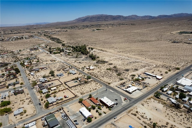 bird's eye view with a mountain view