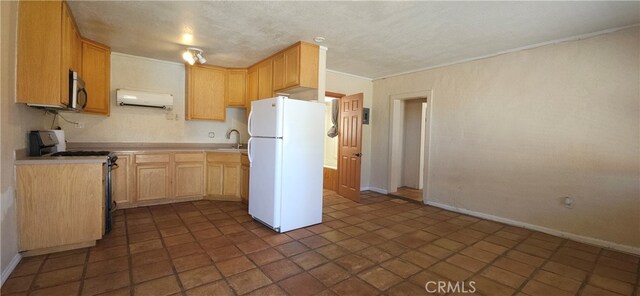 kitchen with white refrigerator, electric range oven, ventilation hood, light brown cabinetry, and crown molding