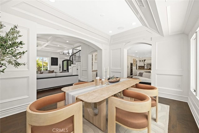 bar featuring beam ceiling, crown molding, dark wood-type flooring, and coffered ceiling