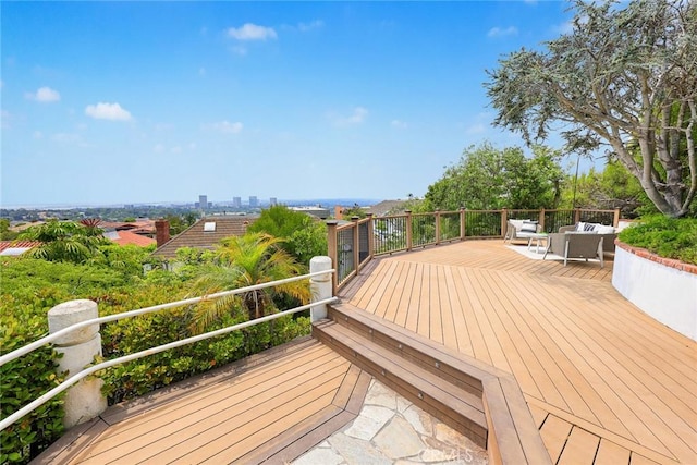 wooden deck with an outdoor hangout area