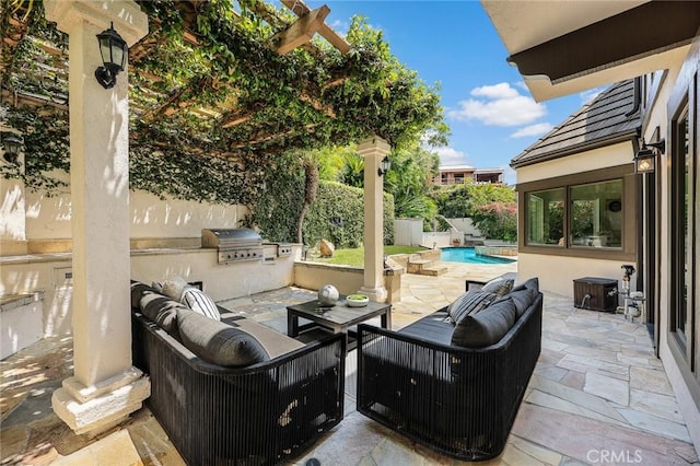 view of patio featuring an outdoor hangout area, a fenced in pool, grilling area, and exterior kitchen