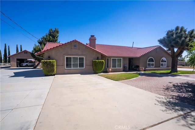 view of front facade featuring a front lawn and a garage