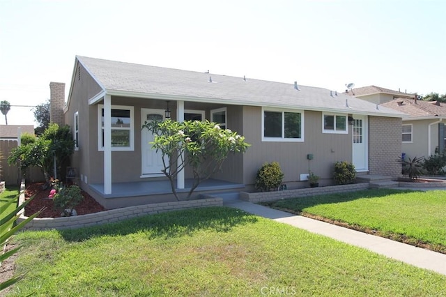 view of front of property with a front lawn