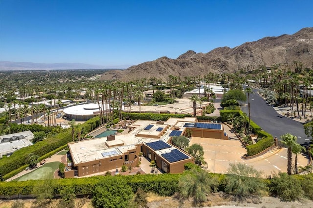 birds eye view of property featuring a mountain view