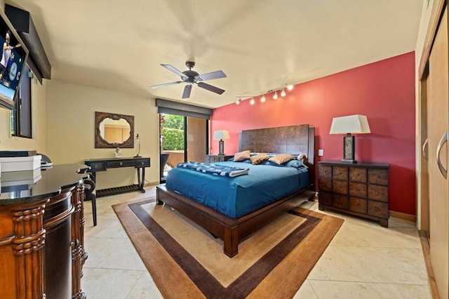 bedroom featuring ceiling fan, light tile patterned floors, and track lighting