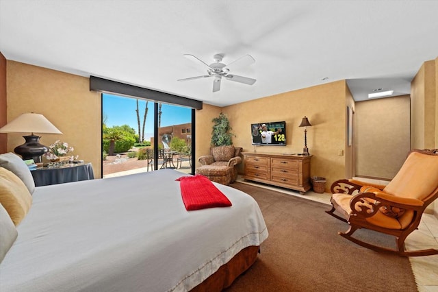 bedroom featuring carpet, access to outside, and ceiling fan