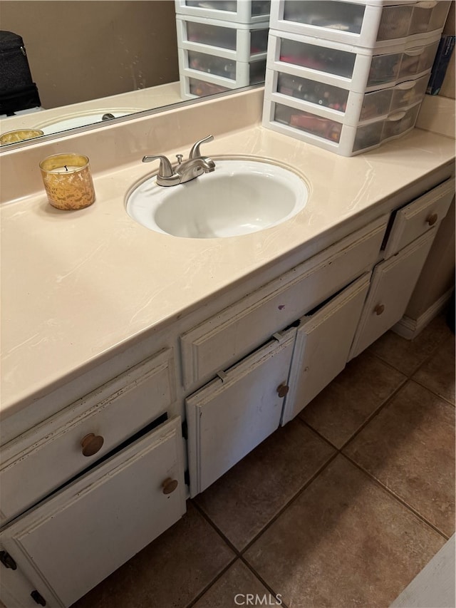 bathroom with vanity and tile patterned floors