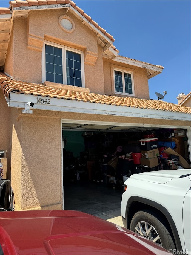 exterior space with a garage