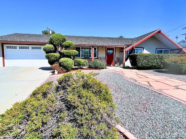 ranch-style house featuring a garage