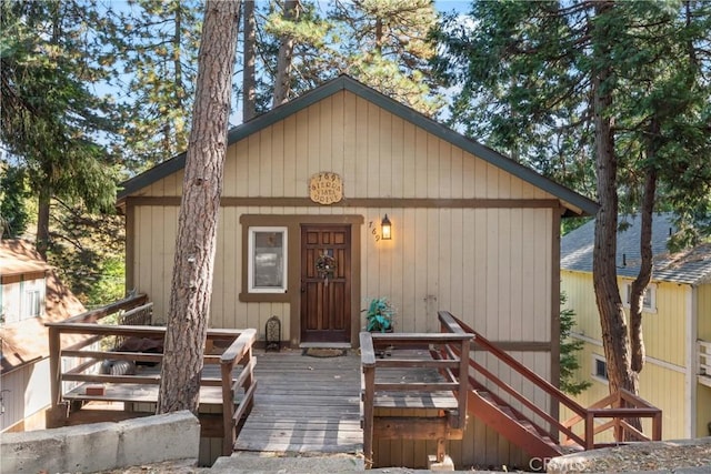 view of front of house with a wooden deck